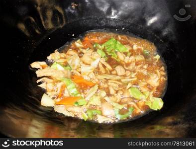 Chinese Restaurant Chicken Dish Cooking in Black Wok