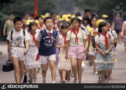 Chinese Schoolkids Walking Together