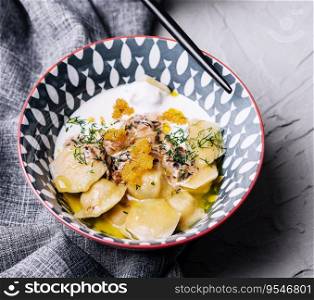 Chinese seafood dumplings garnished with pike caviar