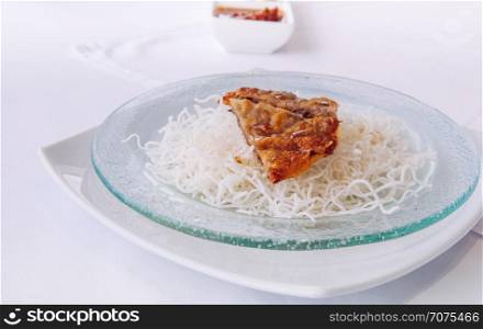 Chinese style appetizer snack fried crispy Chinese shrimp pancake with crispy rice noodle. Close up shot