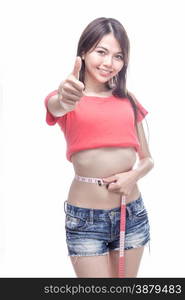 Chinese woman measuring waist with thumb up for successful weight loss