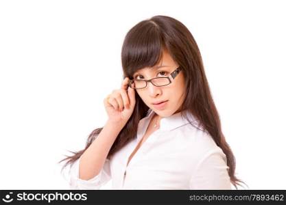 Chinese woman peering over the top of her spectacles, businesswoman or teacher