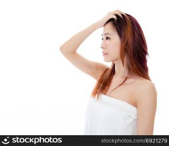 Chinese woman wearing a white towel isolated, beauty concept