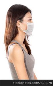 Chinese woman wearing surgical mask with white background, side profile