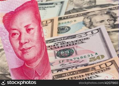 chinese yuan banknotes and u.s. dollars different currencies