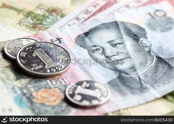 Chinese yuan renminbi banknotes and coins close-up