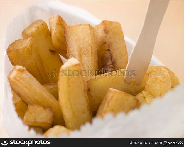 Chip Shop Chips in a Bag with a Wooden Fork