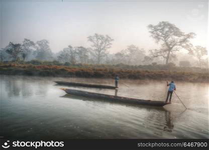 Chitwan National Park. The park is 932 sq. km, is mainly covered by jungle.