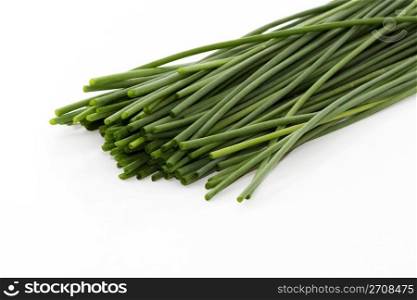 chive bottoms. some cutted chive bottoms on white background