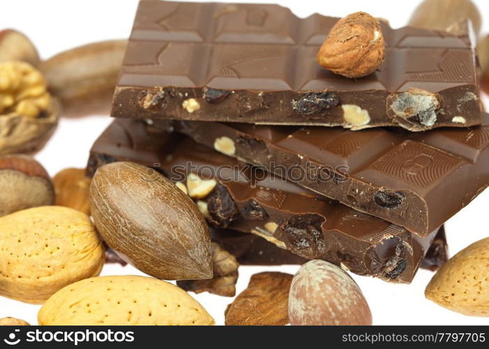 chocolate bar and nuts isolated on white