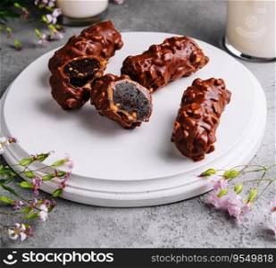 chocolate bars on plate with milk