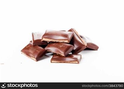 Chocolate bars stack isolated on white background. Chocolate blocks