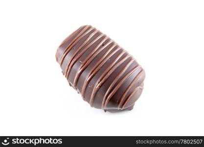 chocolate bonbon filled black liquor and white horizontal