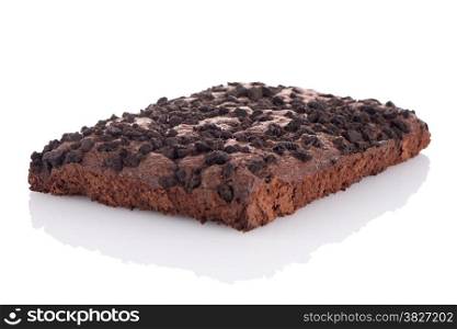 Chocolate brownie cake on white reflective background.