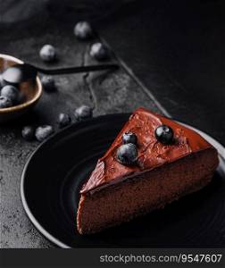 Chocolate brownie cakes with blueberry on plate