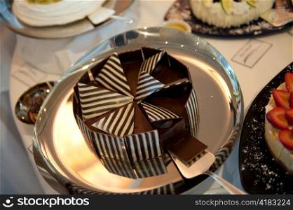 Chocolate Cake in the kitchen of a cruise ship Silver Shadow, East China Sea