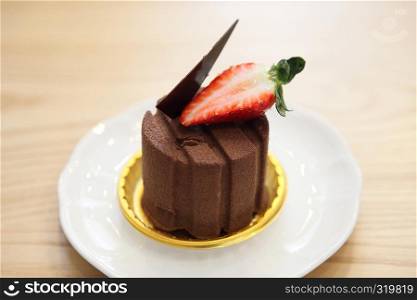 chocolate cake on wood background