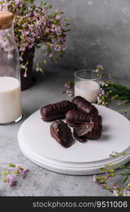 Chocolate cake Potato on white board with milk