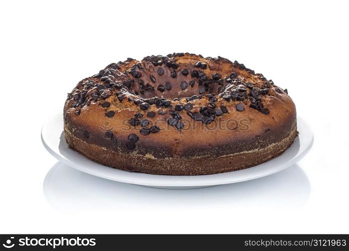 chocolate cake served on white plate on white background
