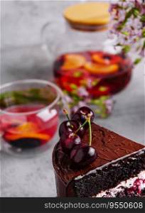 Chocolate cake with cherries and chocolate cream