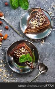 chocolate cake with nuts on the plate