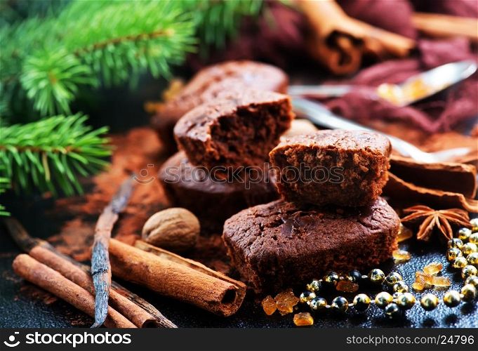 chocolate cake with spice on christmas background