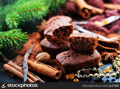 chocolate cake with spice on christmas background