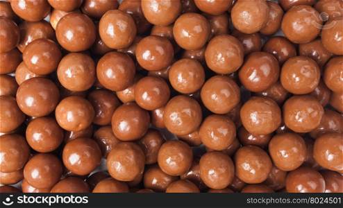 Chocolate candies background. Closeup brown chocolate candy background