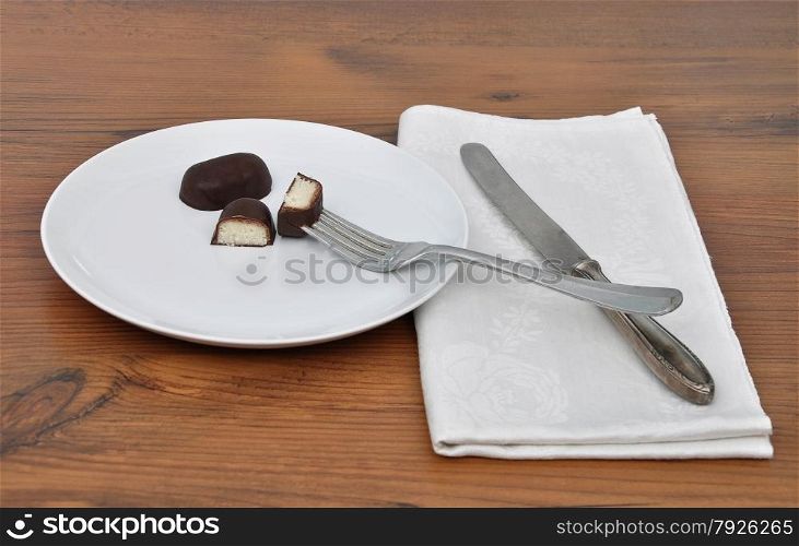 Chocolate candies on plate