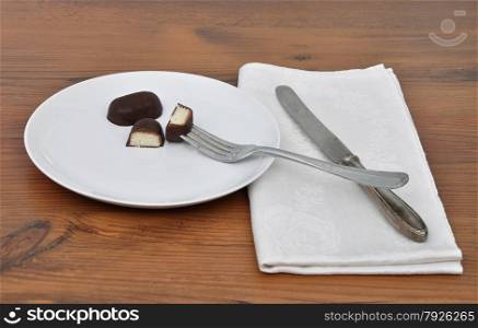 Chocolate candies on plate