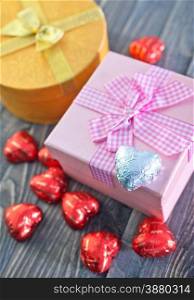 chocolate candy and box for present on a table