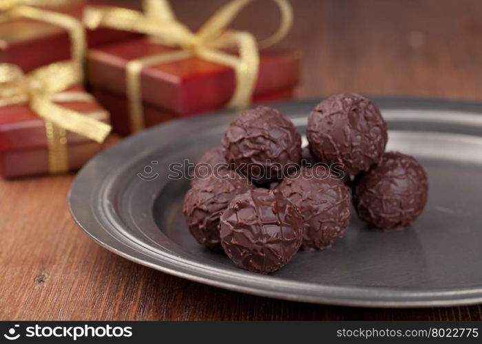 Chocolate candy, on a wooden table