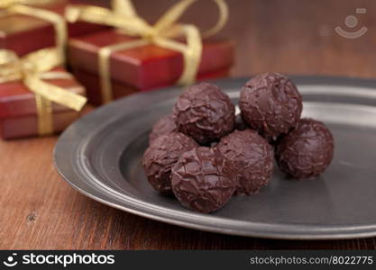 Chocolate candy, on a wooden table