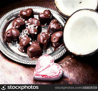 chocolate candy with coconut. chocolate candy with coconut in the form of a heart