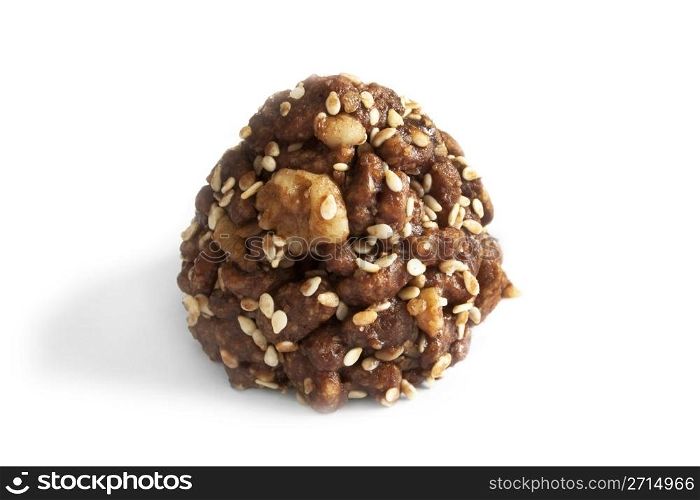 Chocolate candy with sesame isolated on white background