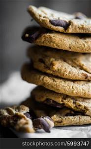 Chocolate chip cookies on rustic background