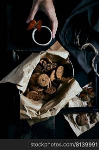 Chocolate chip cookies on rustic background.. Chocolate chip cookies on dark background.