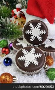 Chocolate Christmas Muffins decorated with marzipan pearl snowflake