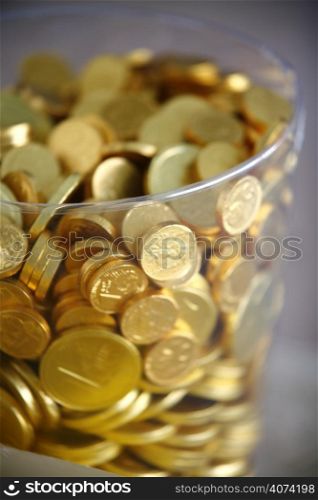 Chocolate coins in a jar