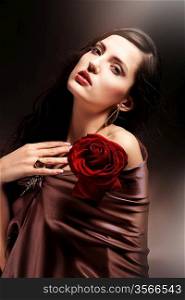 chocolate colored attractive woman with red rose
