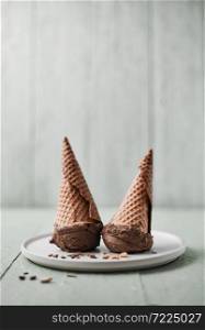 Chocolate cream in a waffle cones.. Chocolate cream.