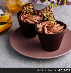 Chocolate cup cakes with tea pot