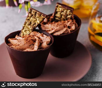 Chocolate cup cakes with tea pot