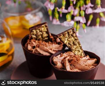 Chocolate cup cakes with tea pot
