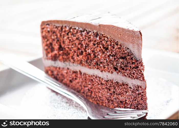 Chocolate custard cake serving on the table