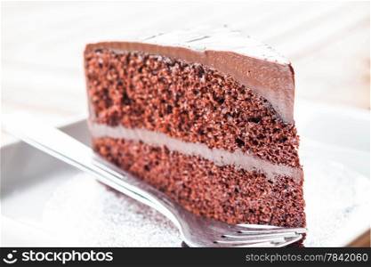 Chocolate custard cake serving on the table