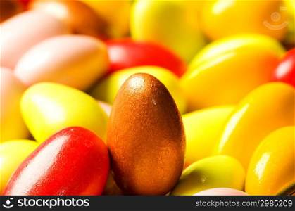 Chocolate eggs of various colours - shallow DOF