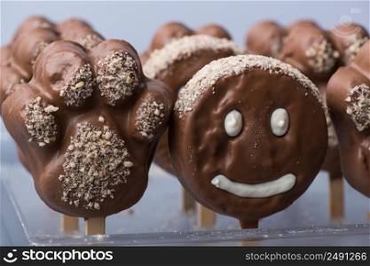 chocolate face shape smiley face cookie. cake and pastries