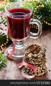 Chocolate filled cookies and juice with festive decorations, selective focus