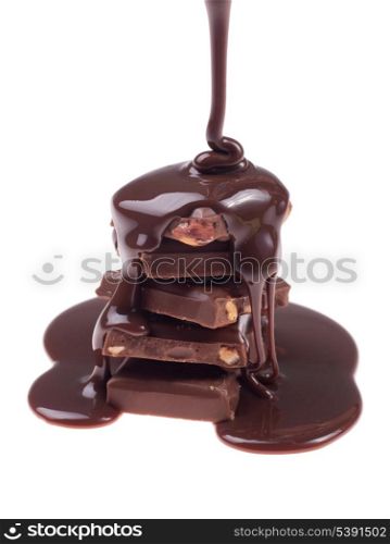Chocolate flow isolated on white background close up